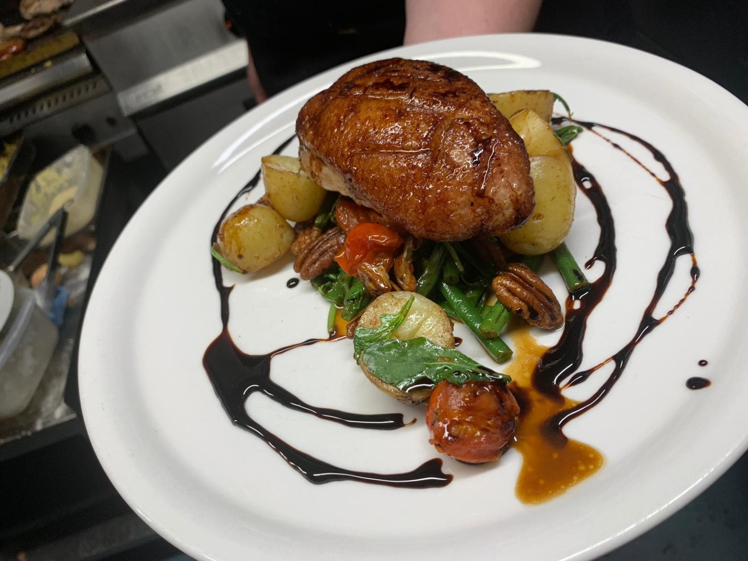 Plated main course at The Woodbine Inn