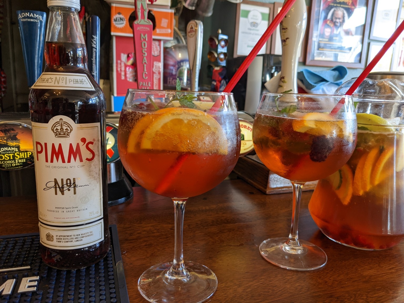 Pimm's No.1 with two large glasses at The Woodbine bar